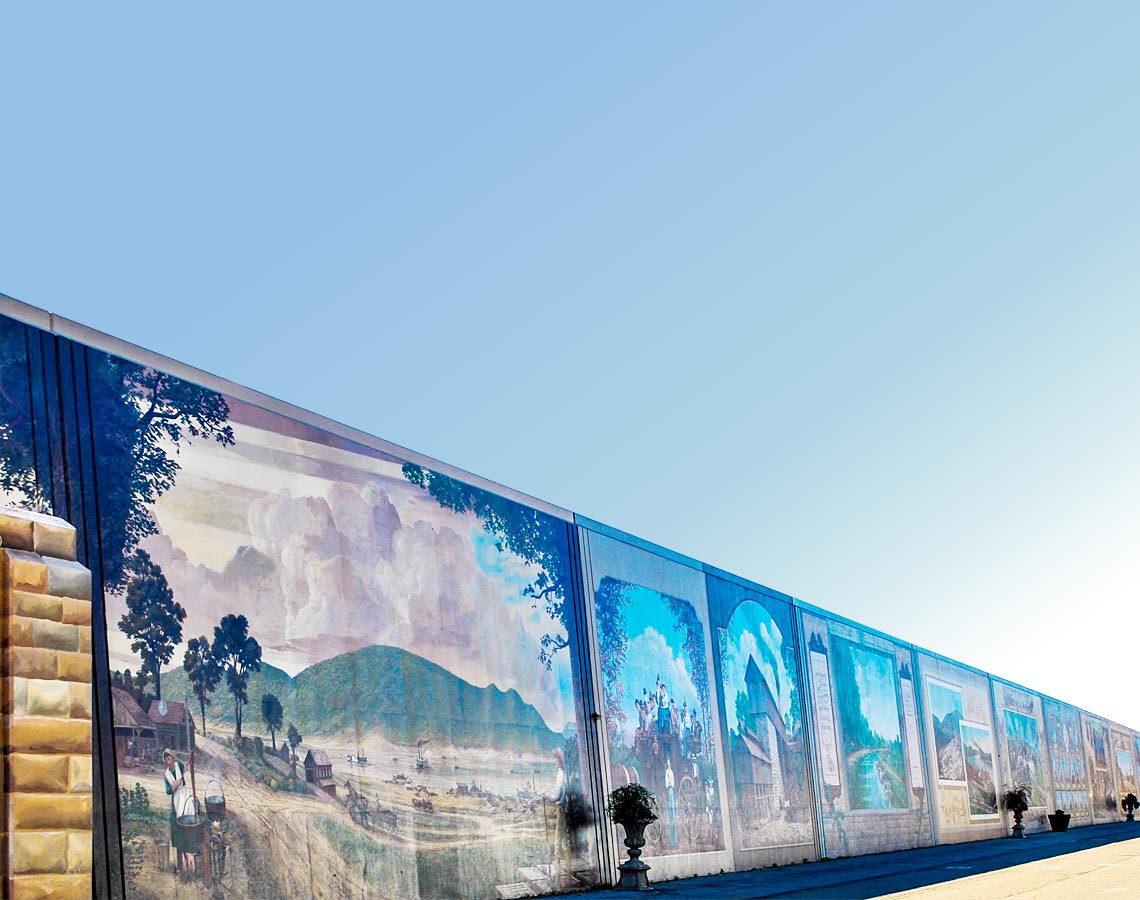 Several sections of mural spanning across the image at an angle, appearing smaller as distance grows